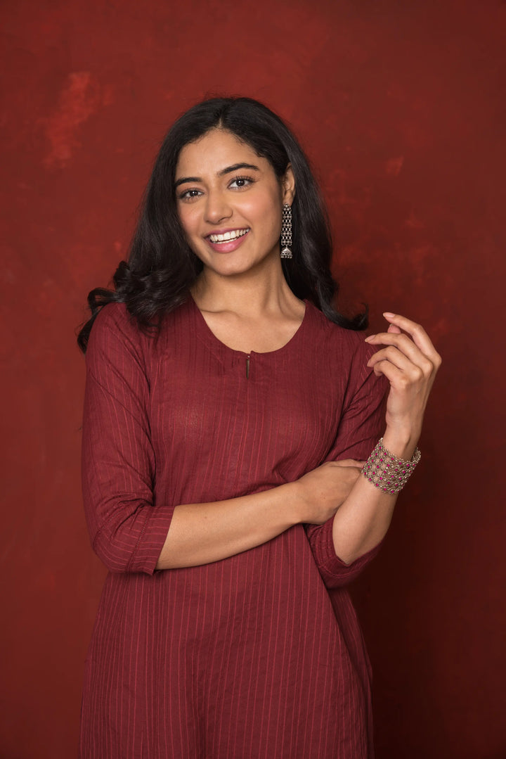 MAROON COTTON DOBBY ROUND SLEEVES HIGHLIGHTED WITH LACE KURTA PANT SET