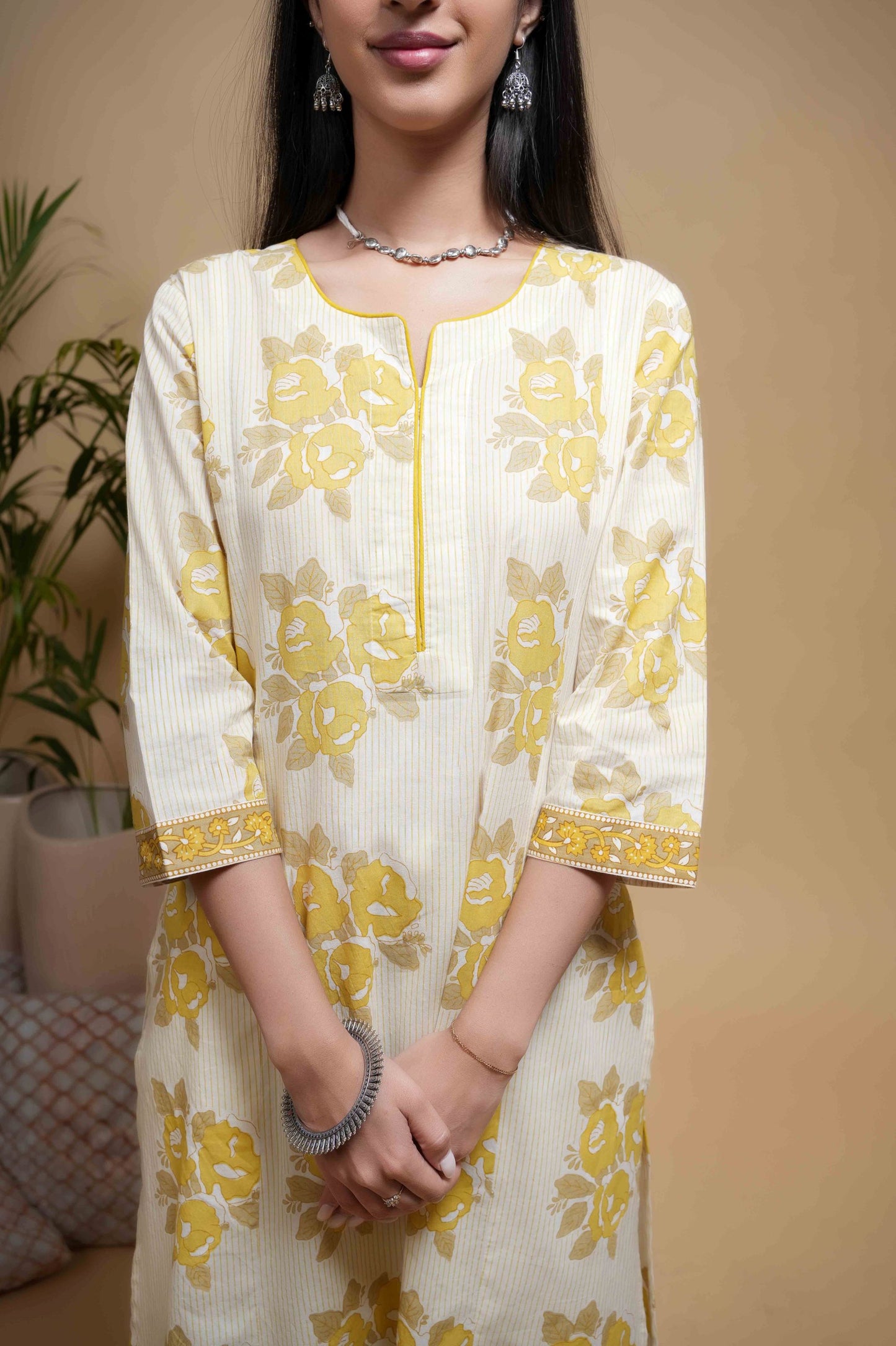 Cream Cotton Round With Small V-Shaped A Solid Yellow Piping Floral Print Kurta For Women's