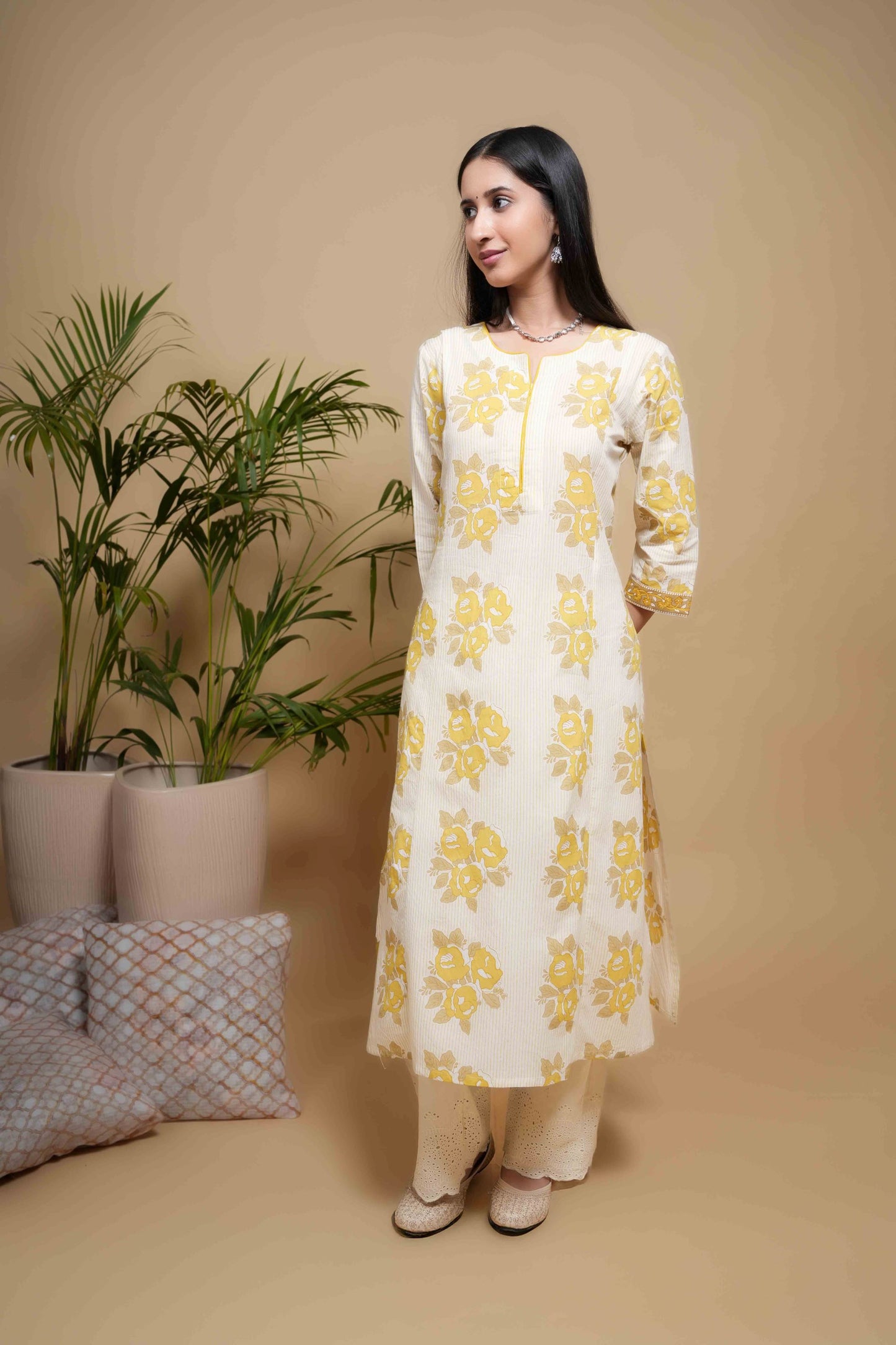 Cream Cotton Round With Small V-Shaped A Solid Yellow Piping Floral Print Kurta For Women's