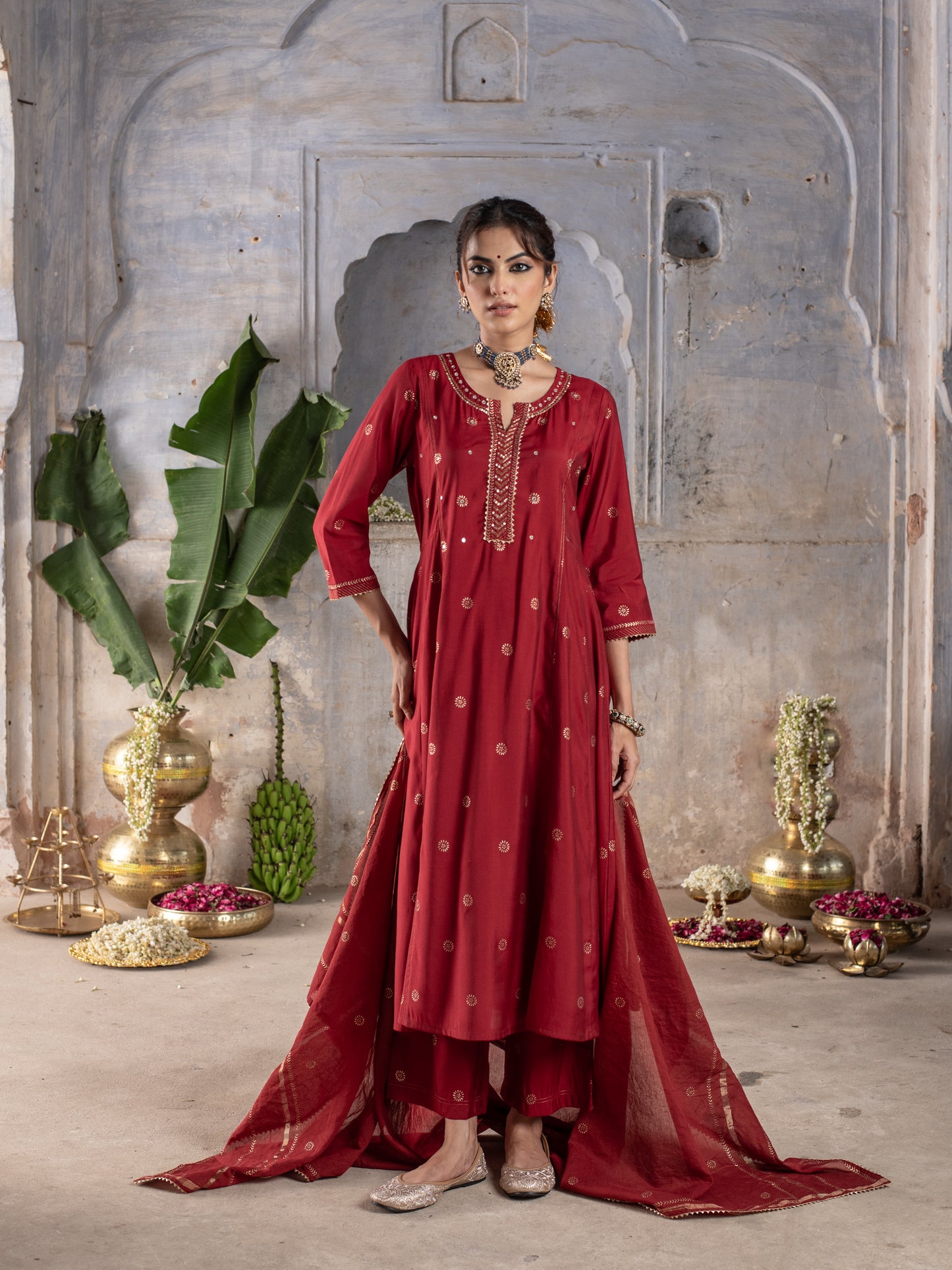 RED CHANDERI ROUND WITH V-CUT NECKLINE HIGHLIGHTED WITH ZARI LINES AND MIRROR WORK WITH GOTA DORIYA DUPATTA