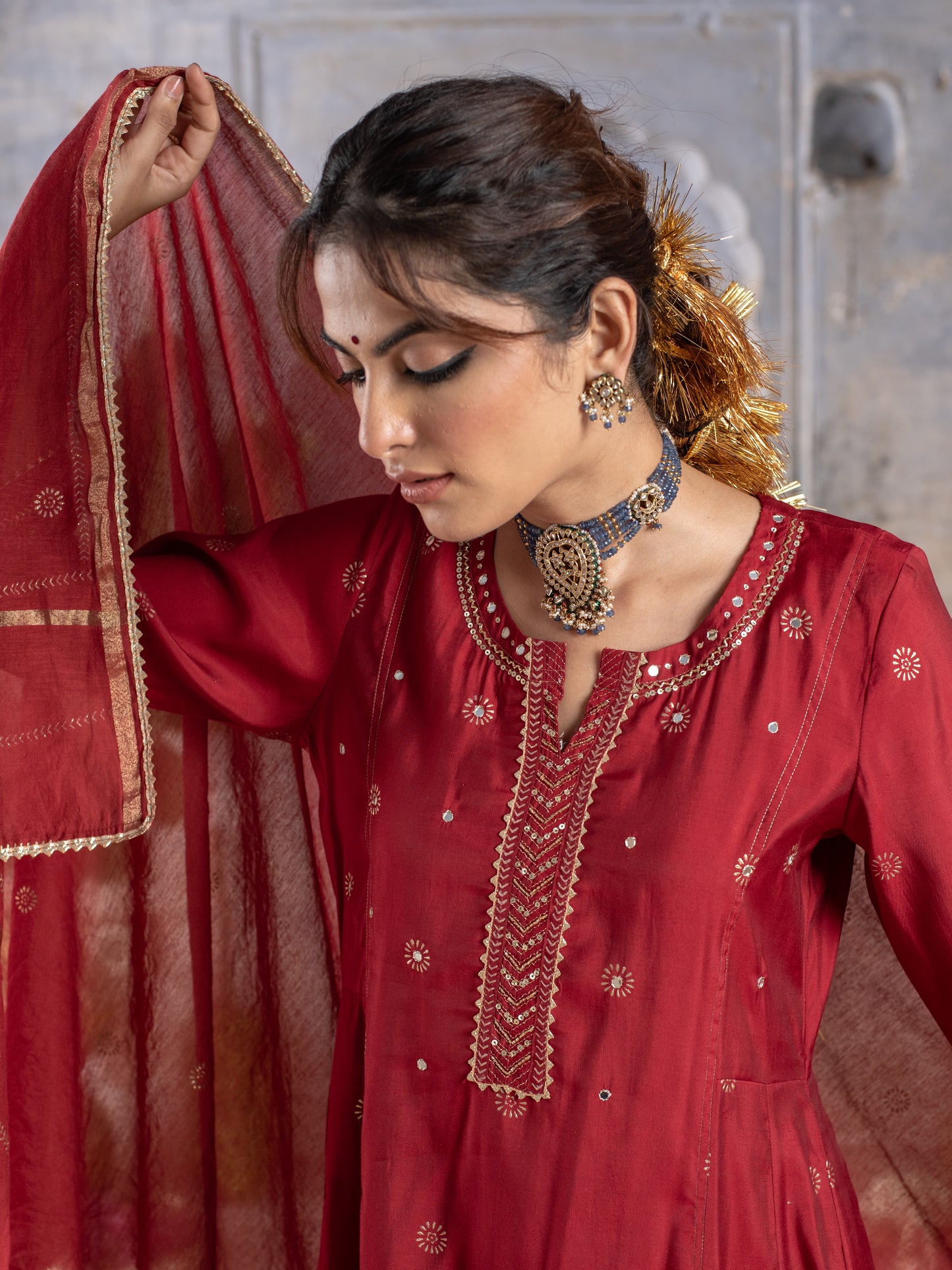 RED CHANDERI ROUND WITH V-CUT NECKLINE HIGHLIGHTED WITH ZARI LINES AND MIRROR WORK WITH GOTA DORIYA DUPATTA