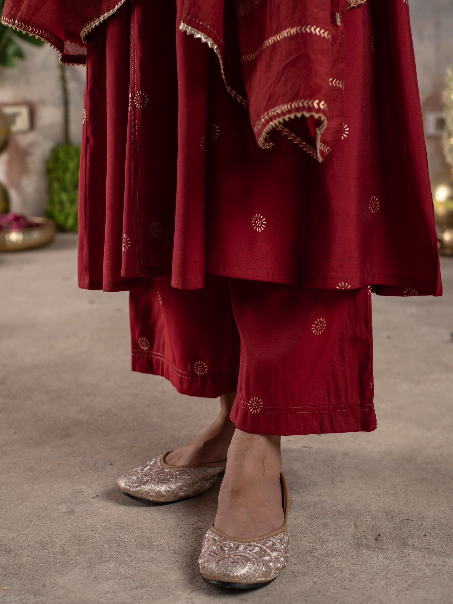 RED CHANDERI ROUND WITH V-CUT NECKLINE HIGHLIGHTED WITH ZARI LINES AND MIRROR WORK WITH GOTA DORIYA DUPATTA