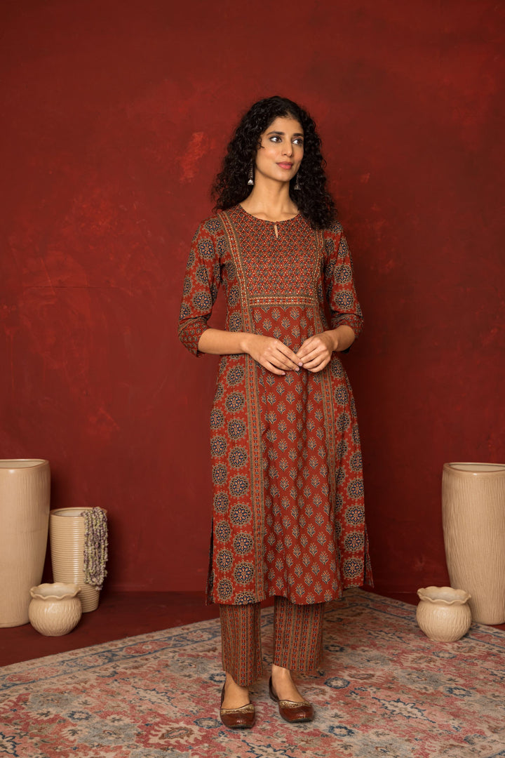 RUST COTTON ROUND NECK BOOTI PRINT YOKE HIGHLIGHTED WITH HAND KATHA KURTA PANT SET
