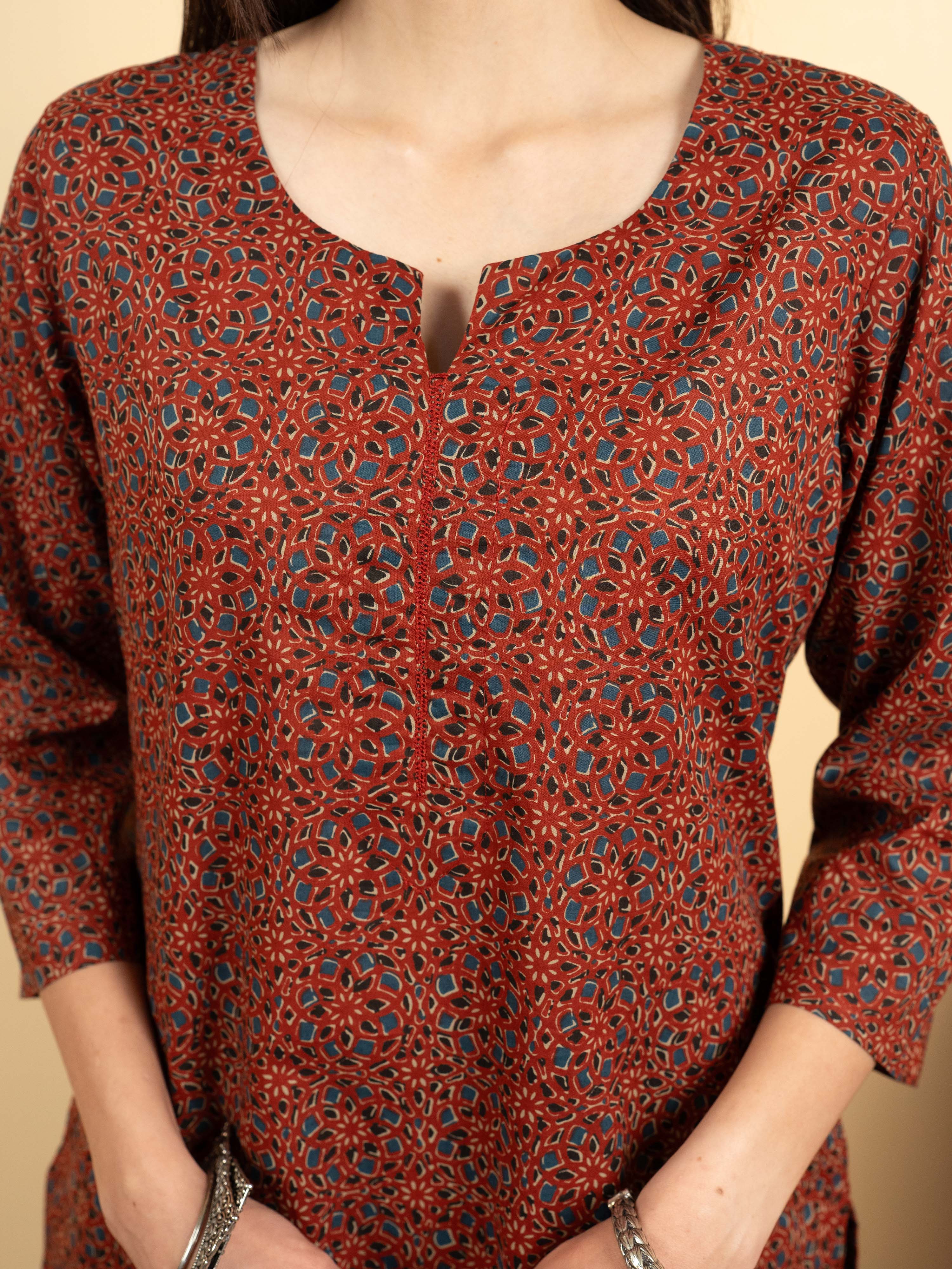 Brick Red Colour Cotton Round With V-Neck Abstract Print Kurta For Women's