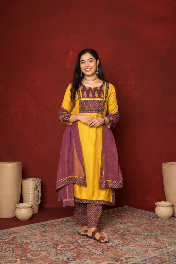 MUSTARD WITH  WINE TWILL BOT ROUND NECK KURTA HIGHLIGHTED WITH YOKE & MIRROR LACE WITH SEQUENCE FULL SET
