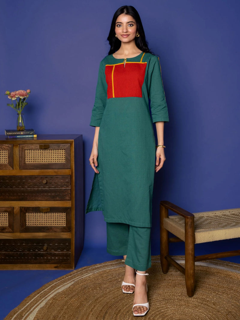 GREEN COTTON LINEN ROUND WITH  V-CUT YOKE HIGHLIGHTED WITH KATHA WORK KURTA PANT SET