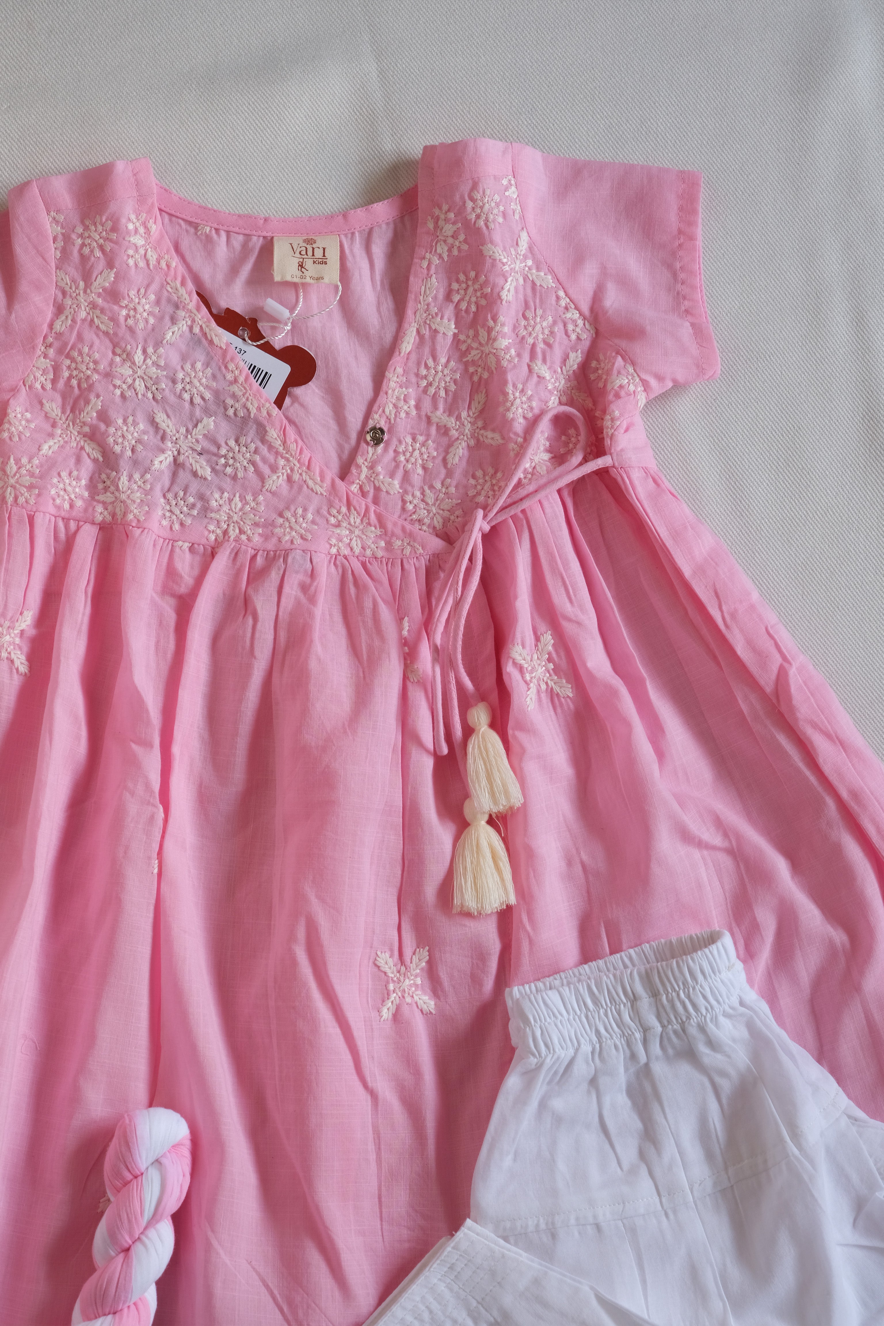 Baby Pink Angrakha Kurta with Off White Salwar and White-Pink Dupatta