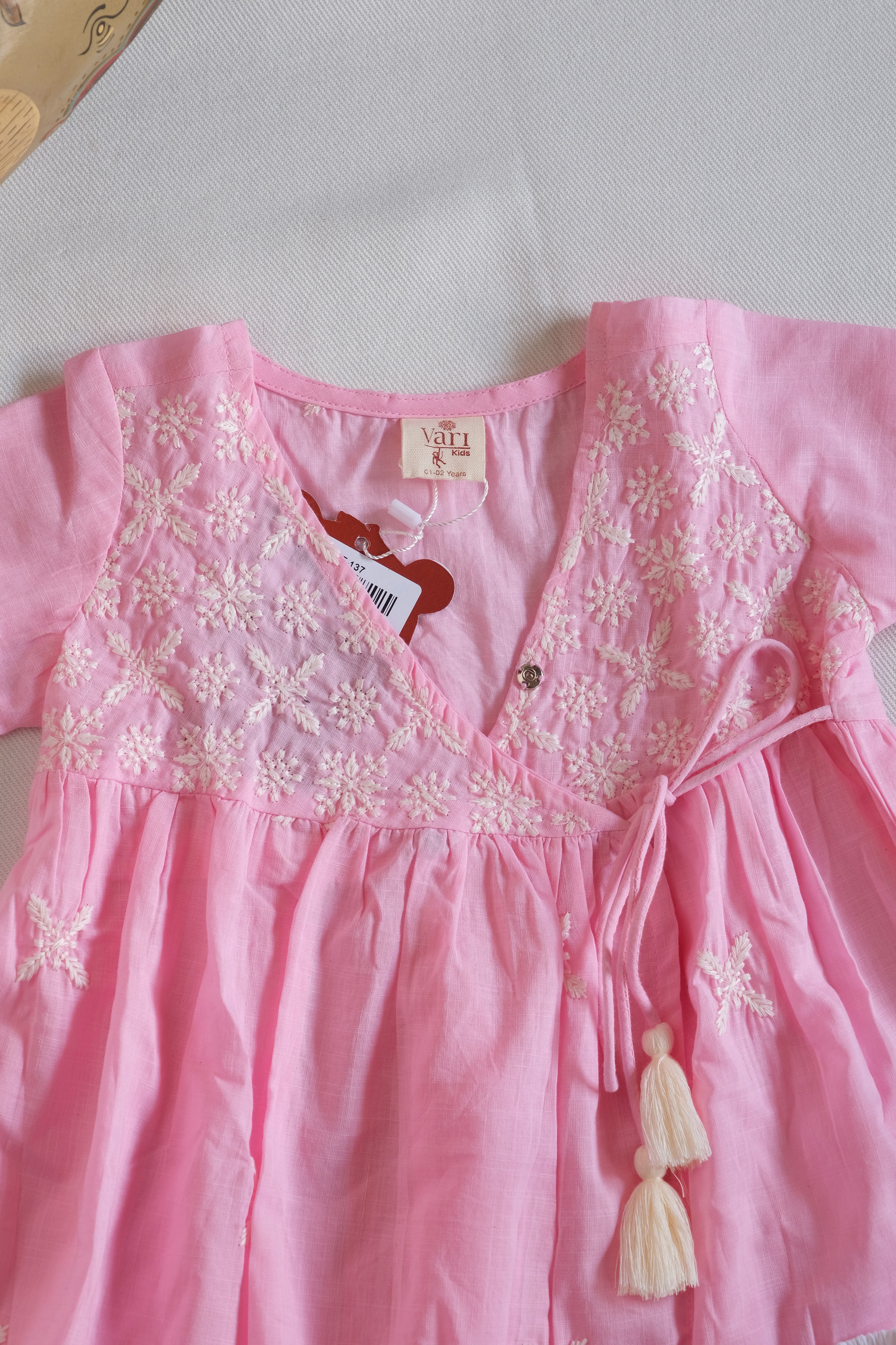 Baby Pink Angrakha Kurta with Off White Salwar and White-Pink Dupatta