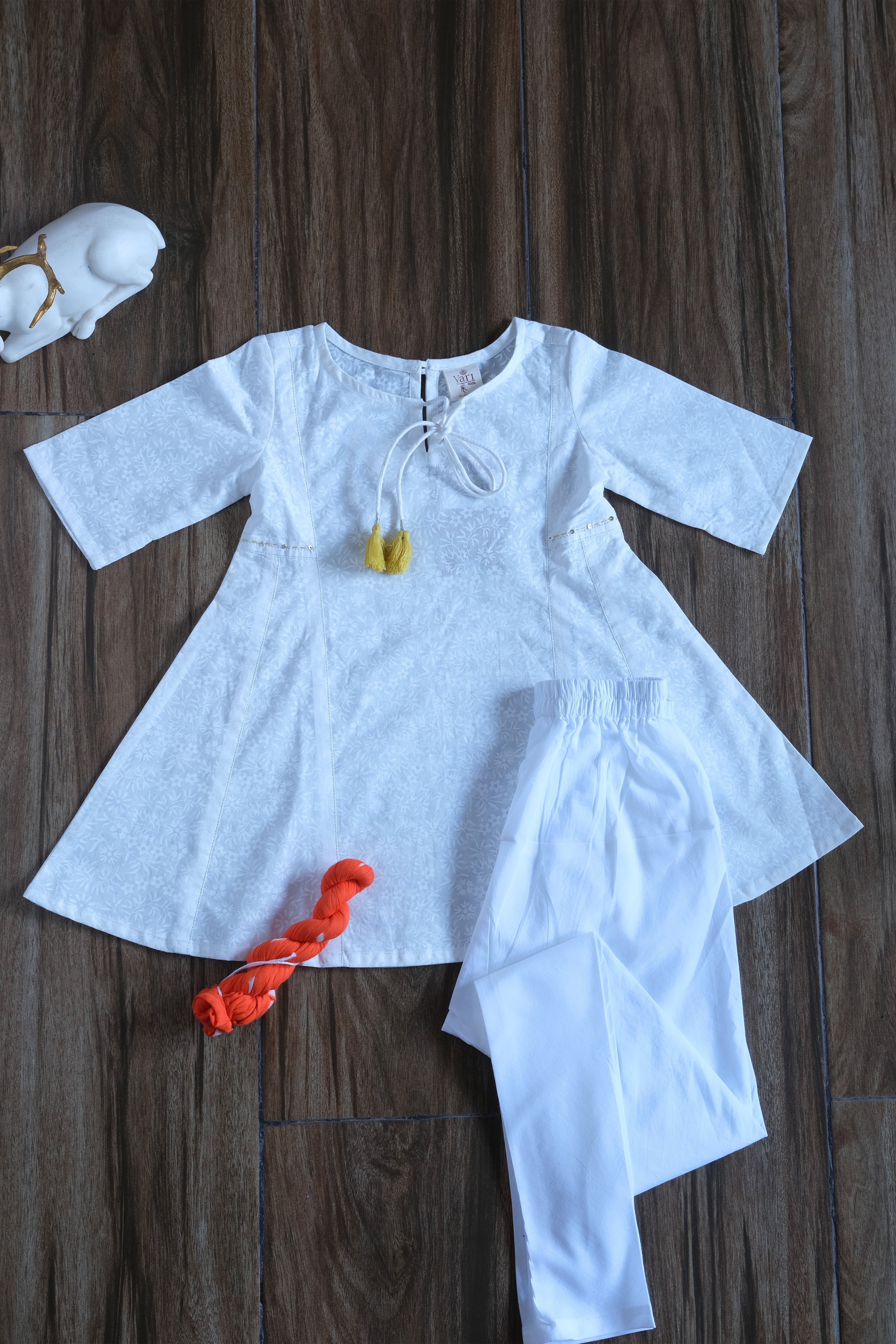 White Kurta with Chudidar Pajama and Orange Dupatta