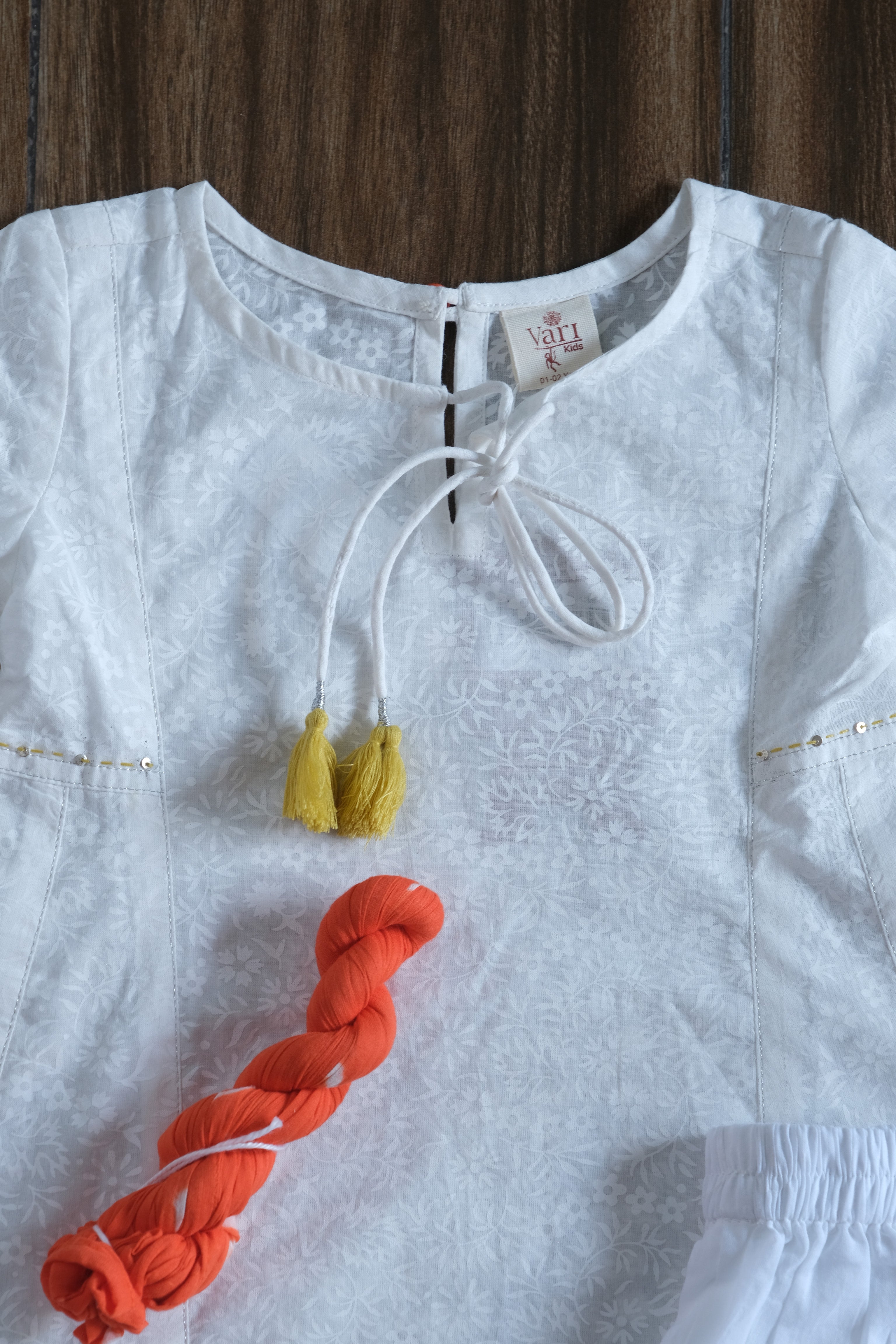 White Kurta with Chudidar Pajama and Orange Dupatta