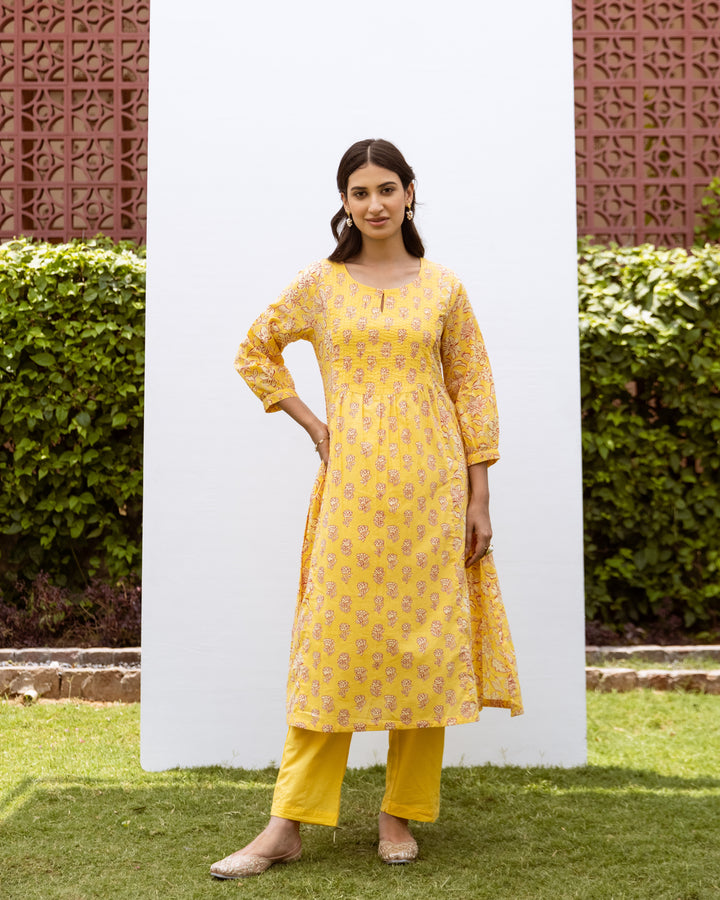 Yellow Cotton Floral Print Round Neck Kurta Pant Set for Women's