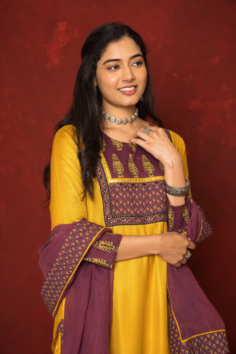 MUSTARD WITH  WINE TWILL BOT ROUND NECK KURTA HIGHLIGHTED WITH YOKE & MIRROR LACE WITH SEQUENCE FULL SET