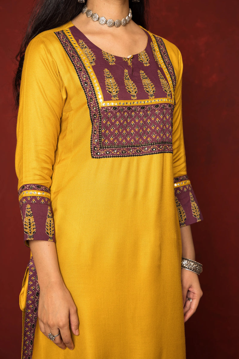 MUSTARD WITH  WINE TWILL BOT ROUND NECK KURTA HIGHLIGHTED WITH YOKE & MIRROR LACE WITH SEQUENCE FULL SET