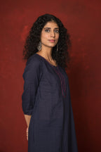 INDIGO BLUE COTTON DOBBY ROUND KURTA HIGHLIGHTED WITH HAND KATHA AND SEQUENCE WORK KURTA PANT SET