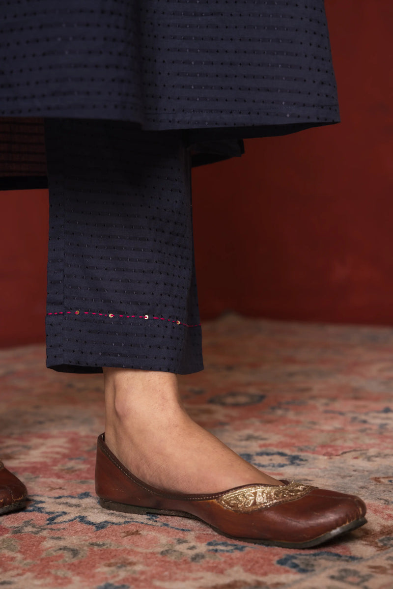 INDIGO BLUE COTTON DOBBY ROUND KURTA HIGHLIGHTED WITH HAND KATHA AND SEQUENCE WORK KURTA PANT SET