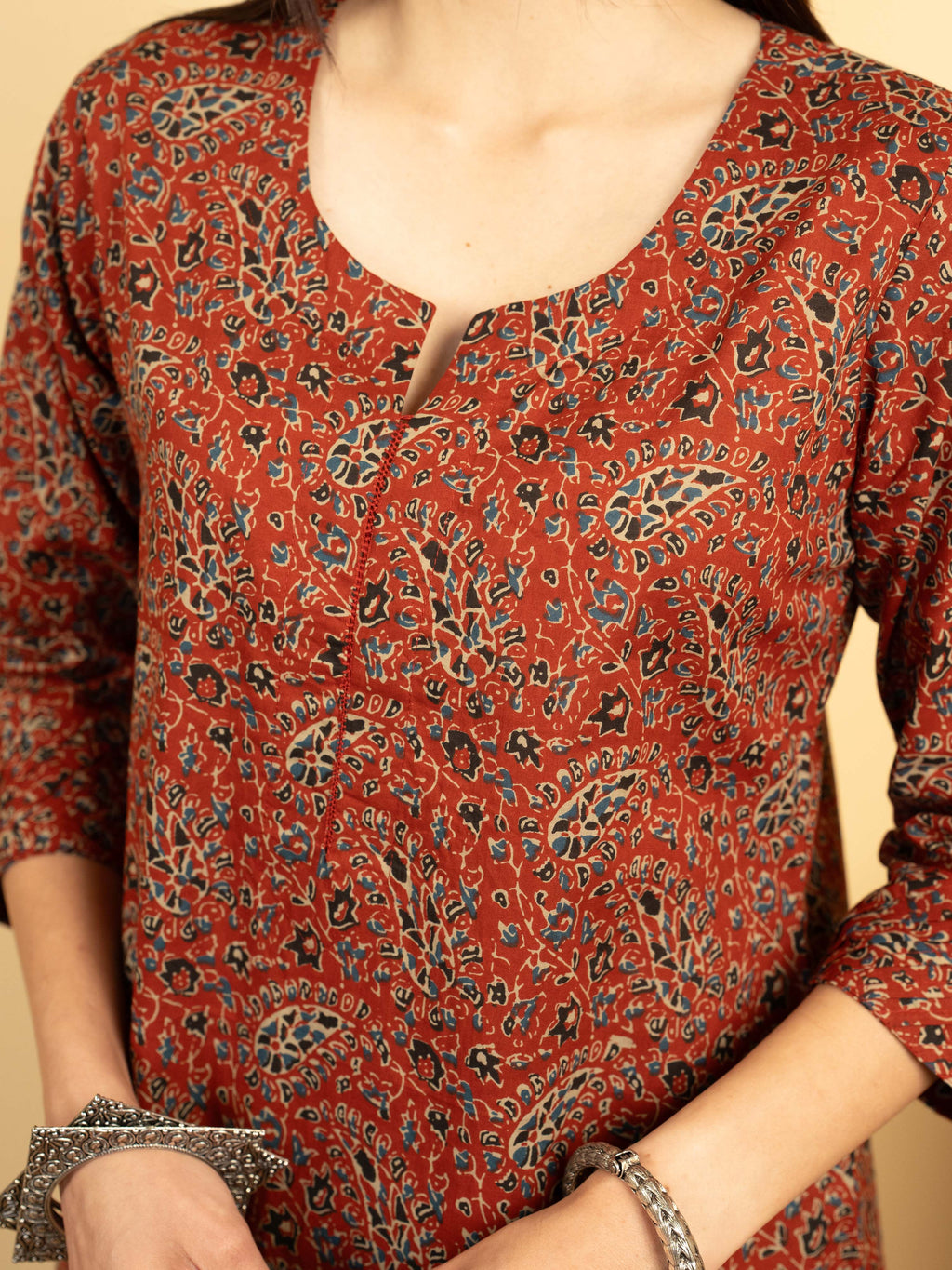 Brick Red Colour Cotton Round With V-Neck Jaal Print Kurta For Women's
