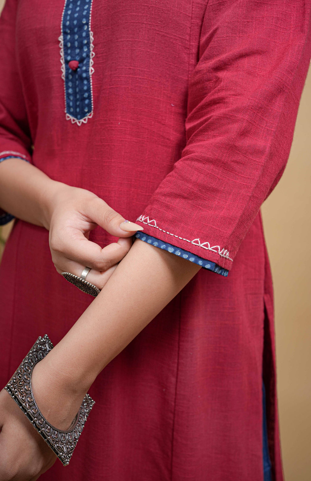 Maroon Flax Round Neck Yoke Highlighted With Buttons And Katha Work Kurta