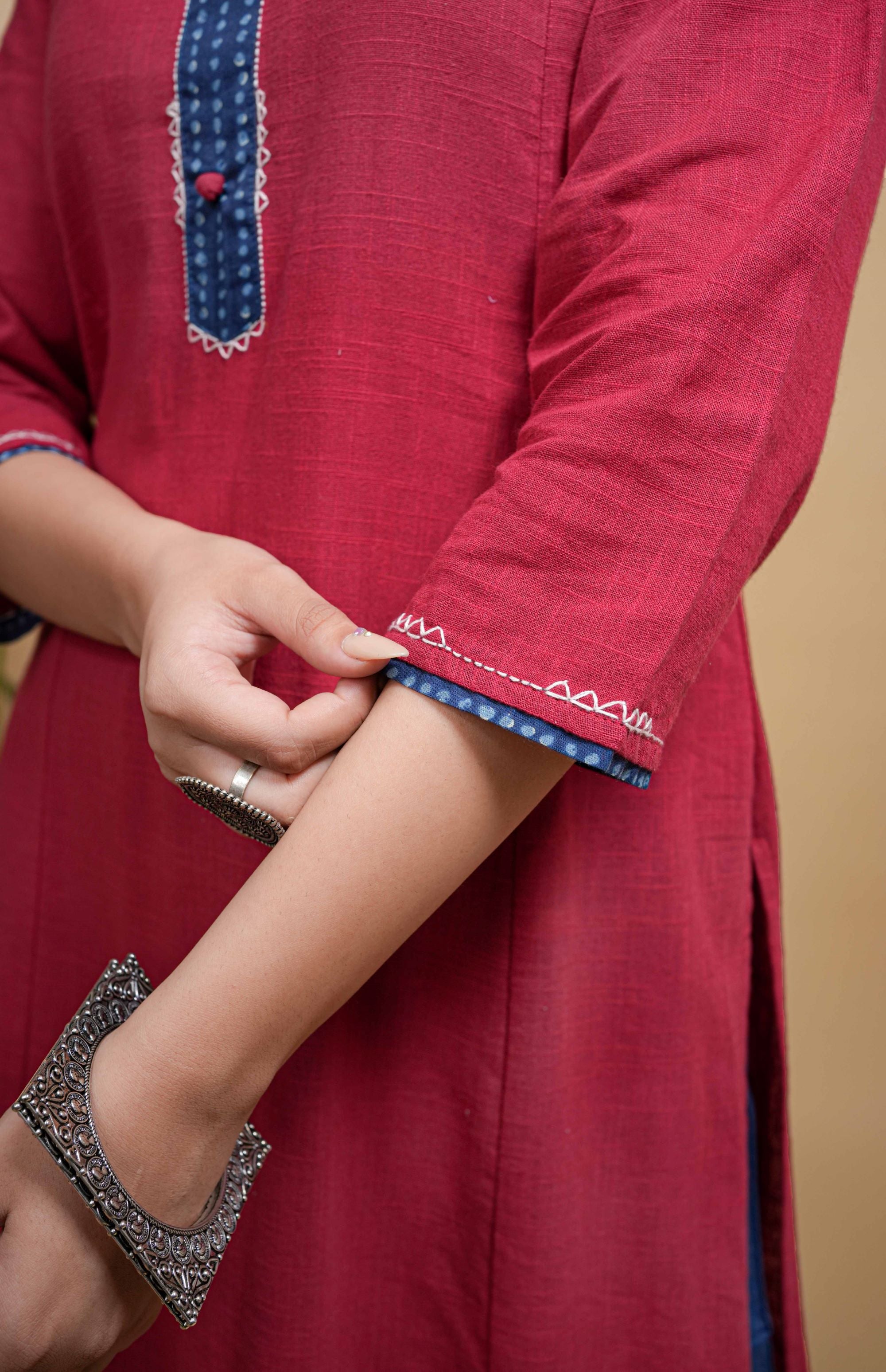 Maroon Flax Round Neck Yoke Highlighted With Buttons And Katha Work Kurta