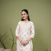 Cream Cotton Floral Printed Sequence & Mirror Work Round with V-Neck Women's Kurta & Pant Set