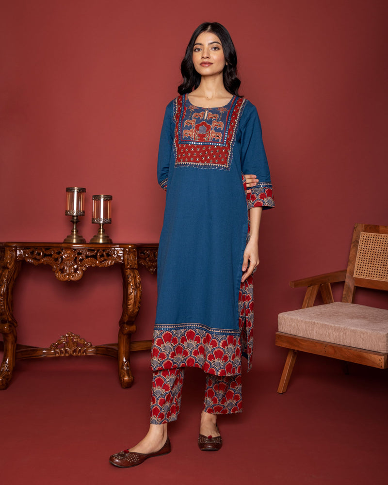 BLUE COTTON ROUND NECK BOOTI PRINT YOKE HIGHLIGHTED WITH BORDERS WITH MIRROR AND KATHA WORK KURTA PANT SET